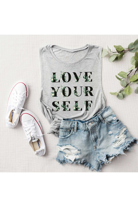 Step out of your comfort zone and get ready to conquer in the LOVE YOURSELF FLOWER GRAPHIC MUSCLE TANK. This must-have shirt challenges you to break free and take daring risks, inspiring motivation and strength. Invigorate your style and take on life's adventures!