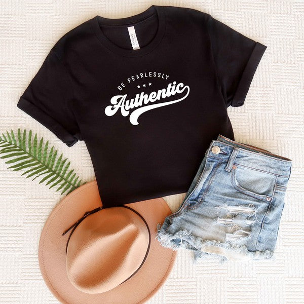 Unleash your true self with the Be Fearlessly Authentic graphic tee. This empowering design serves as a reminder to embrace your individuality and walk through life with confidence. Whether you're pairing it with jeans, skirts, or leggings, this comfortable short sleeve tee is a perfect fit for anyone who wants to make a bold statement.