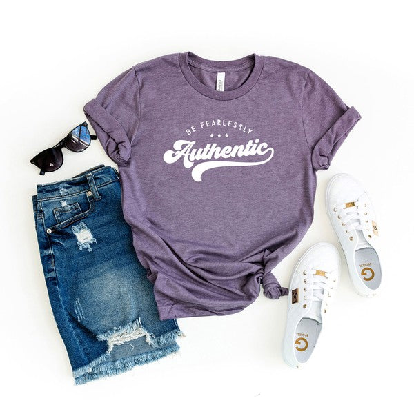 Unleash your true self with the Be Fearlessly Authentic graphic tee. This empowering design serves as a reminder to embrace your individuality and walk through life with confidence. Whether you're pairing it with jeans, skirts, or leggings, this comfortable short sleeve tee is a perfect fit for anyone who wants to make a bold statement.