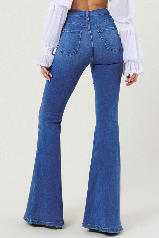 High-Rise Distressed Flare Jeans – Bold, Edgy, and Timeless