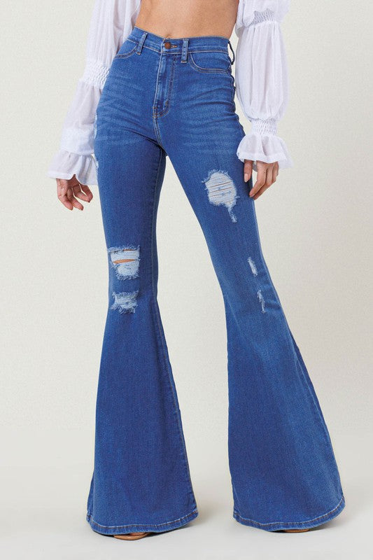 High-Rise Distressed Flare Jeans – Bold, Edgy, and Timeless