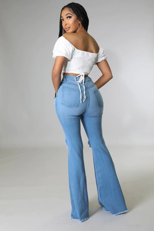 Knee Rip Flare Jean in Medium Wash – A Retro Twist on Modern Style